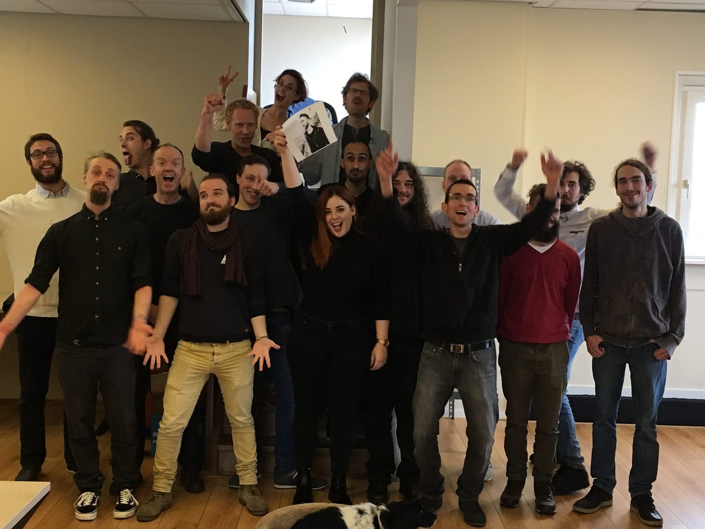 a group of people standing next to each other.